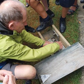 Roel Michels demonstrates how a standard rat trap works.